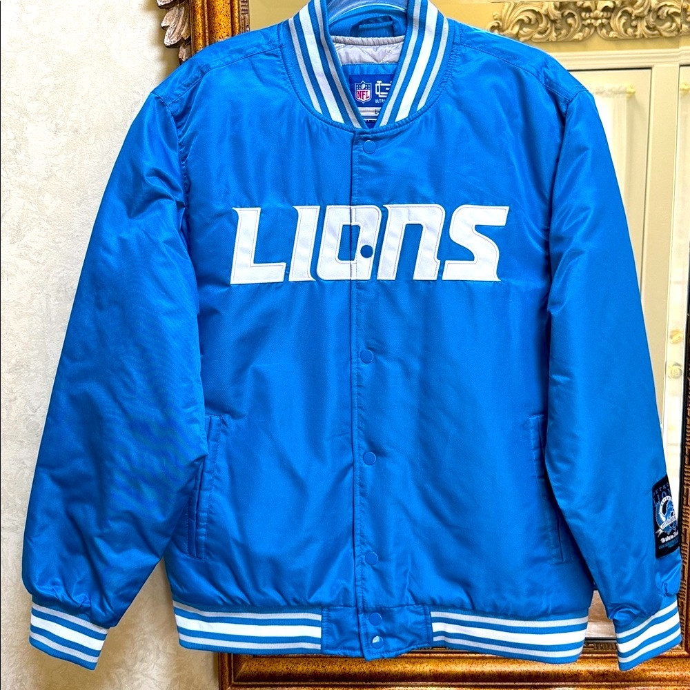 NFL Lions Varsity Jacket. Size L. White Lions letters on front. Lion emblem back